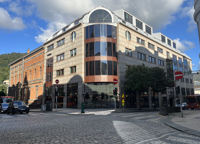 Facade of the building, round on the corner.