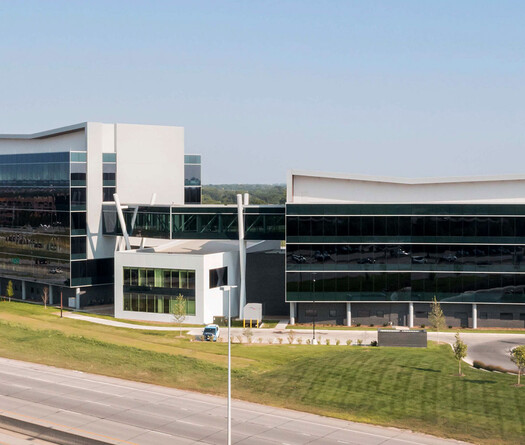 Exterior of unique building with custom smart glass windows.
