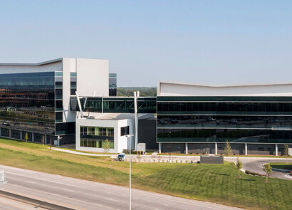 Exterior of unique building with custom smart glass windows.