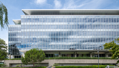 Exterior of building with smart glass windows from left to right. 