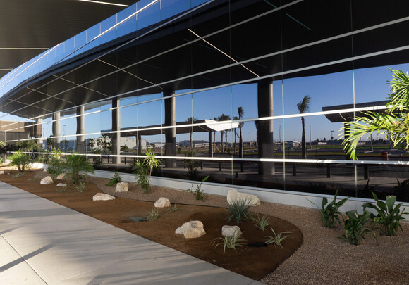 Building with SageGlass smart windows with landscape reflecting off the electrochromic glass.