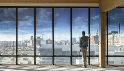 SageGlass Harmony Smart Windows with person looking out.