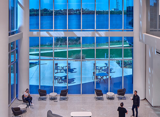 SageGlass Smart Windows in atrium with people enjoying the daylight and views.