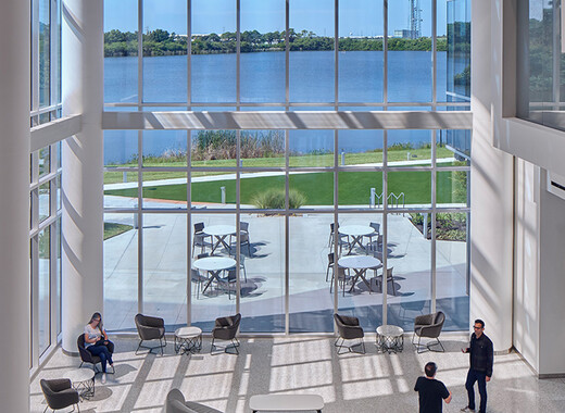 SageGlass Smart Windows in atrium with people enjoying the daylight and views.