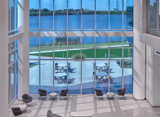 SageGlass Smart Windows in atrium with people enjoying the daylight and views.