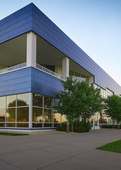 Exterior of building with smart glass windows.